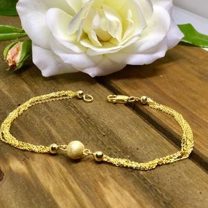 Sterling silver triple strand gold bracelet